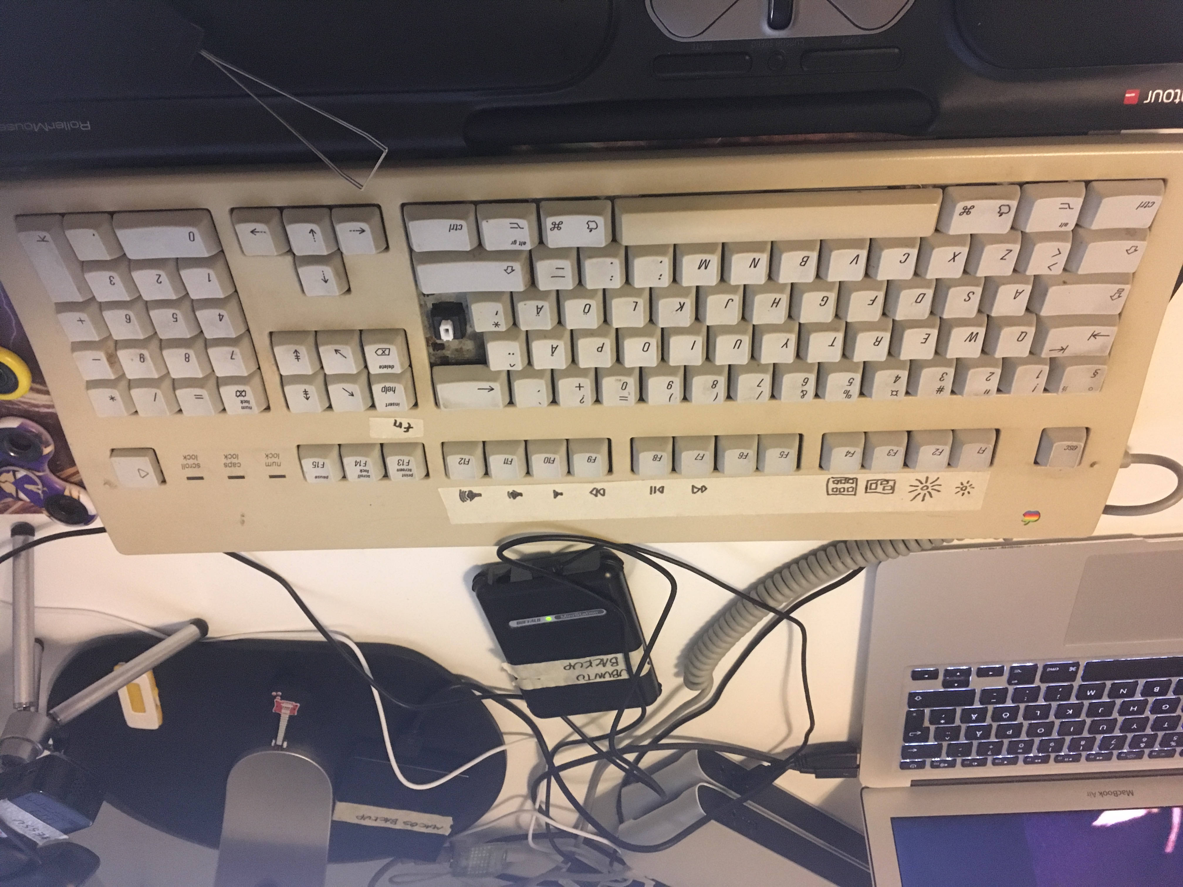 the keyboard with the carriage return key removed, exposing the swithch