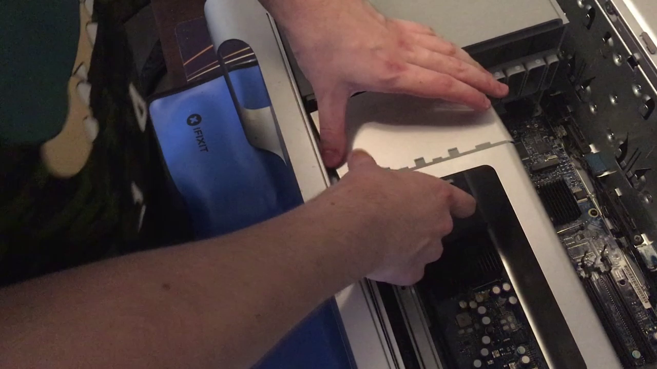 struggling to remove the shroud