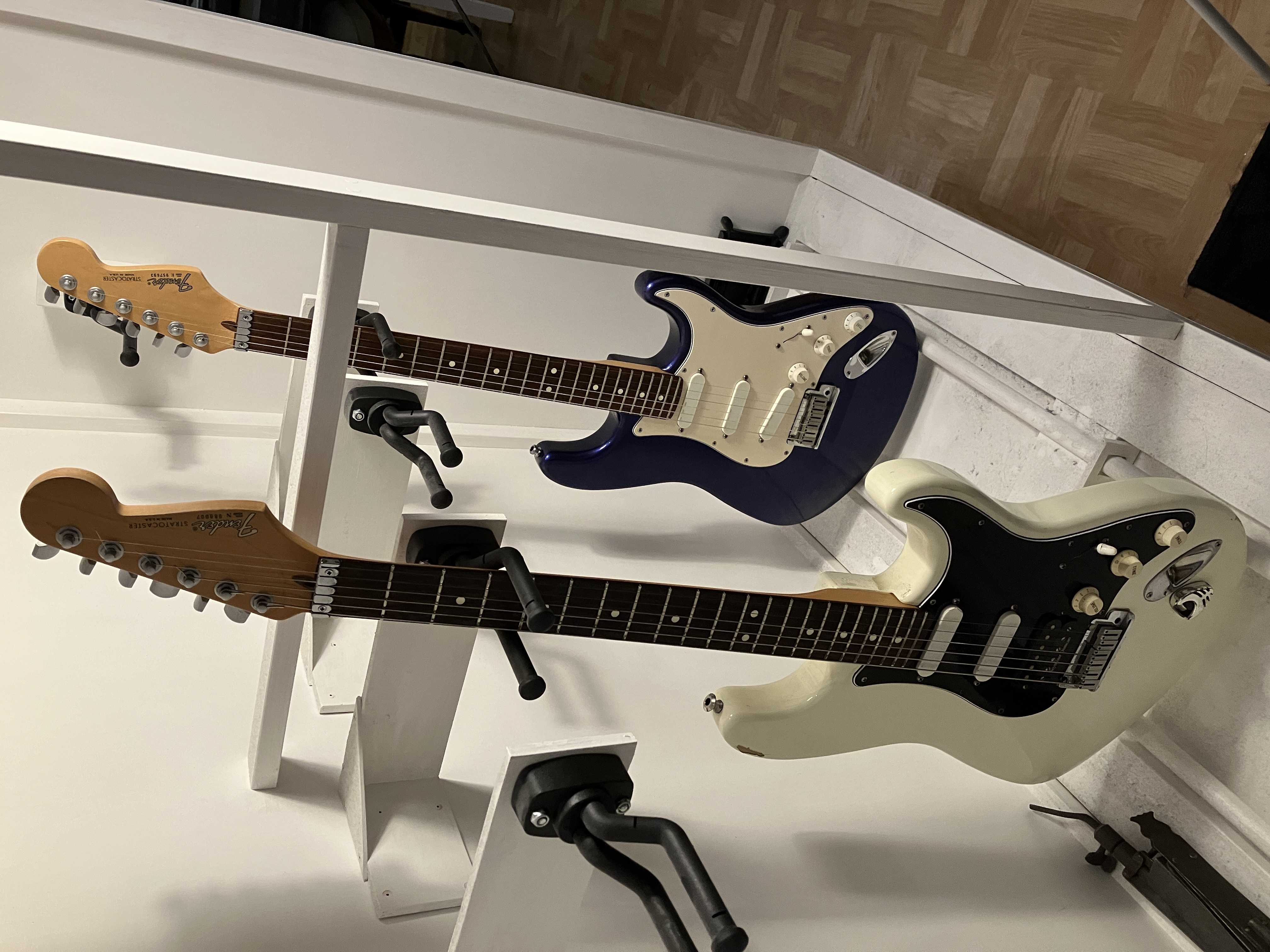 Two Fender Stratocaster Pluses